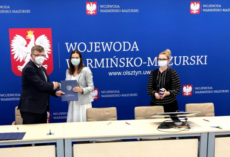 - podp_um_komun_24_wrz.png